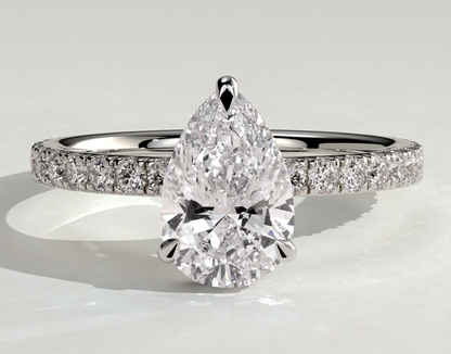 Custom Pear Claw Solitaire with Wrap Around Hidden Halo and Pave Band Engagement Ring